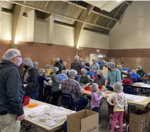 Minnesota Churches pack thousands of meals for Ukraine